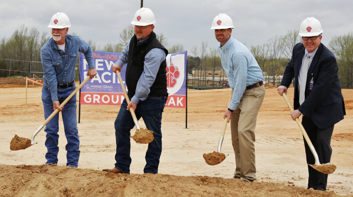 Alba-Golden Trustees and Superintendent wield shovels at the groundbreaking of the new Agricultural Project Facility at Alba-Golden Schools. From left: Mike Ragsdale, Chad Dailey, Jason Stovall and Superintendent Cole McClendon.
